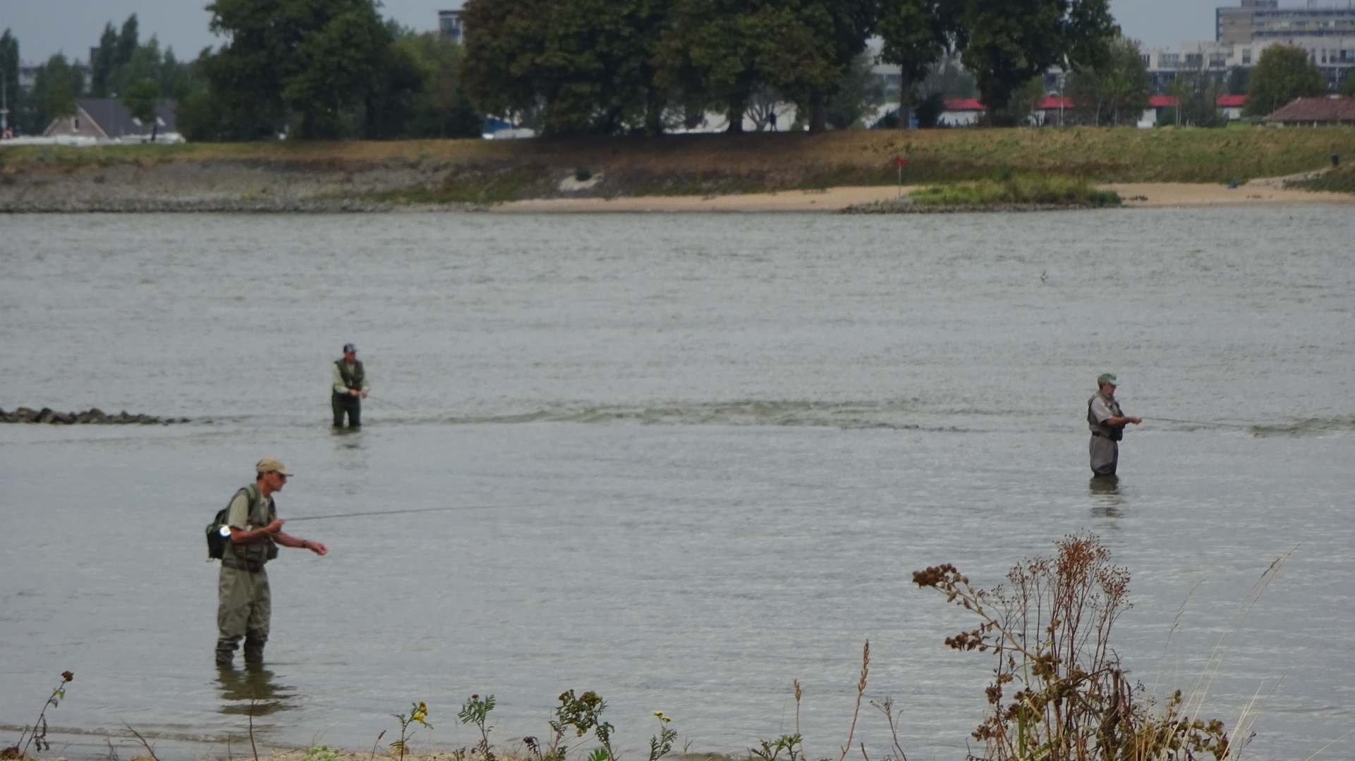 Vissers in het water